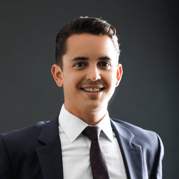 A picture of a lawyer smilling.